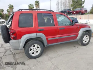 2007 Jeep Liberty Sport with VIN 1J4GK48K97W525047, listed as a IAAI auction lot 42022247 with 196,896 mi miles. Bid and sale history available at carsss.com. Image 4.
