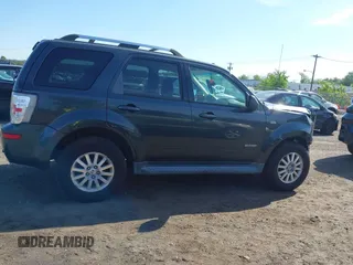 2008 Mercury Mariner Premier с VIN 4M2CU97178KJ28931, выставлен на аукционе IAAI как лот 42235188 с пробегом 128 626 миль миль и . История ставок и продаж доступна на DreamBid. Изображение 13.