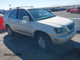 1999 Lexus RX 300 Luxury SUV with VIN JT6GF10U9X0015877, listed as a IAAI auction lot 41666610 with 1 mi miles. Bid and sale history available at carsss.com. Image 1.