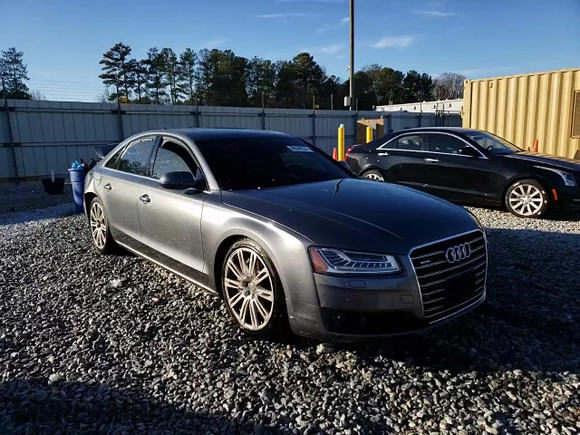 2015 Audi A8 z VIN WAUJGAFD9FN022023, wystawiony jako Copart lot #86048354 z przebiegiem Nie podano mil oraz Szkoda całkowita • Salvage title. Historia ofert i sprzedaży dostępna na DreamBid. Obrazek 13.