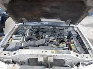 2005 Ford Explorer Sport Trac XLS z VIN 1FMZU77K75UB52008, wystawiony jako IAAI lot #42103222 z przebiegiem 196 605 mil mil oraz . Historia ofert i sprzedaży dostępna na DreamBid. Obrazek 10.