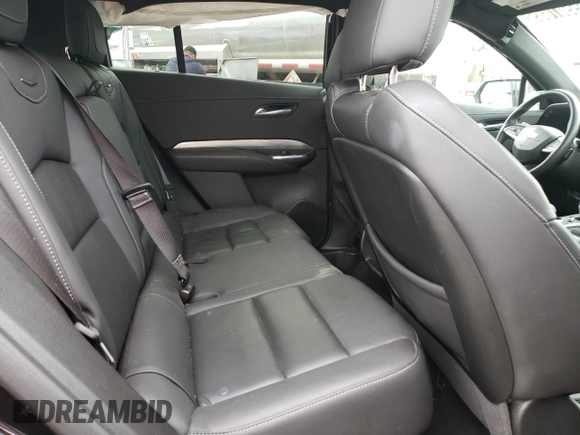 2024 Cadillac XT4 FWD Premium Luxury z VIN 1GYFZCR43RF221412, wystawiony jako Copart lot #55507885 z przebiegiem 23 702 mil mil oraz Tytuł czysty. Historia ofert i sprzedaży dostępna na DreamBid. Obrazek 11.