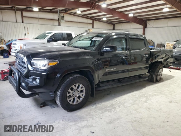 2017 Toyota Tacoma SR5 with VIN 5TFCZ5AN8HX067720, listed as a Copart auction lot 84801184 with 76,148 mi miles and Salvage title. Bid and sale history available at DreamBid. Image 1.