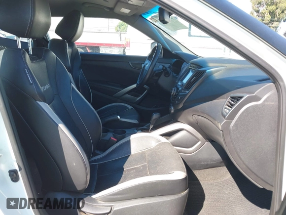 2013 Hyundai Veloster Turbo with VIN KMHTC6AE4DU158224, listed as a IAAI auction lot 42725813 with Not provided miles and . Bid and sale history available at DreamBid. Image 5.