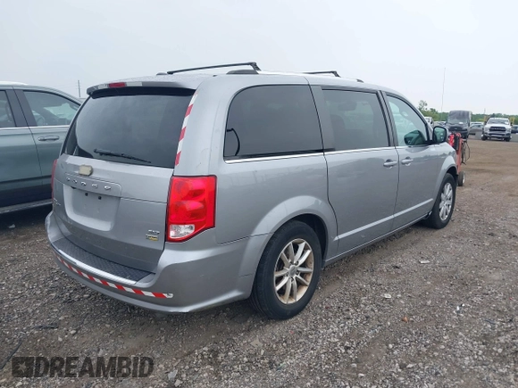 2018 Dodge Grand Caravan SXT z VIN 2C4RDGCG7JR301434, wystawiony jako IAAI lot #42510771 z przebiegiem 270 524 mil mil oraz . Historia ofert i sprzedaży dostępna na DreamBid. Obrazek 4.
