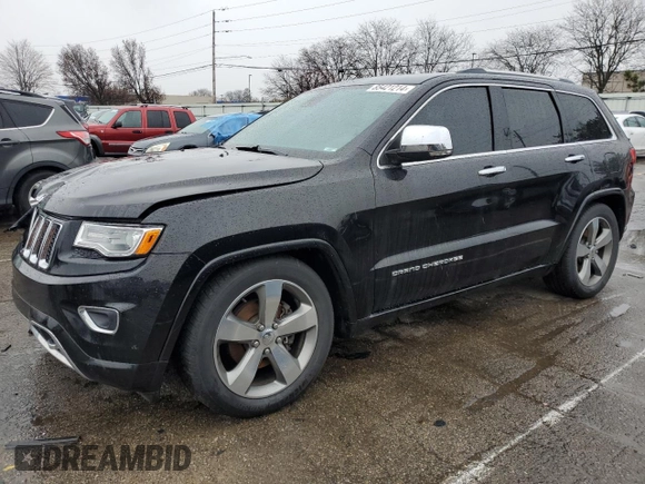 2015 Jeep Grand Cherokee Overland with VIN 1C4RJFCG7FC925995, listed as a Copart auction lot 85421214 with 142,266 mi miles and Salvage Title. Bid and sale history available at carsss.com. Image 1.