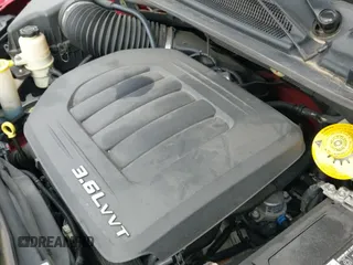 2015 Dodge Grand Caravan American Value with VIN 2C4RDGBG9FR650409, listed as a IAAI auction lot 41928932 with 171,337 mi miles and . Bid and sale history available at DreamBid. Image 13.