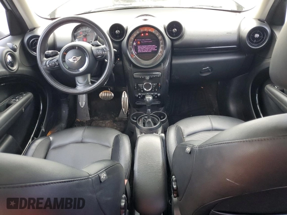 2015 MINI Countryman S z VIN WMWZC3C58FWT06471, wystawiony jako Copart lot #57570585 z przebiegiem 101 963 mil mil oraz Tytuł czysty. Historia ofert i sprzedaży dostępna na DreamBid. Obrazek 8.