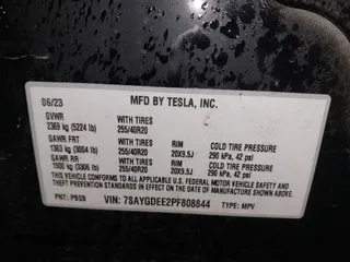 2023 Tesla Model Y Long Range with VIN 7SAYGDEE2PF808844, listed as a IAAI auction lot 41941905 with 39,951 mi miles and . Bid and sale history available at carsss.com. Image 9.