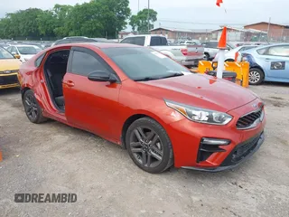 2021 Kia Forte GT-Line z VIN 3KPF34AD7ME410270, wystawiony jako IAAI lot #42259704 z przebiegiem 65 310 mil mil oraz . Historia ofert i sprzedaży dostępna na DreamBid. Obrazek 1.