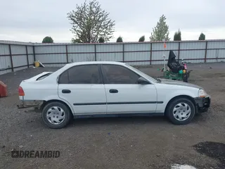 1998 Honda Civic DX with VIN 2HGEJ6629WH551418, listed as a IAAI auction lot 42137262 with 180,704 mi miles. Bid and sale history available at carsss.com. Image 14.