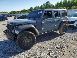 2024 Jeep Wrangler Sport S z VIN 1C4PJXDG2RW346671, wystawiony jako Copart lot #57966375 z przebiegiem 9 430 mil mil oraz Szkoda całkowita • Salvage title. Historia ofert i sprzedaży dostępna na DreamBid. Obrazek 1.