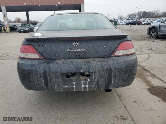2000 Toyota Camry Solara SE with VIN 2T1CF22P5YC294384, listed as a Copart auction lot 82477634 with 267,469 mi miles and Salvage Title. Bid and sale history available at carsss.com. Image 6.