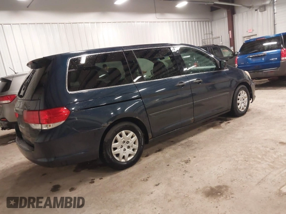 2009 Honda Odyssey LX z VIN 5FNRL38229B042383, wystawiony jako IAAI lot #42080457 z przebiegiem 195 653 mil mil oraz . Historia ofert i sprzedaży dostępna na DreamBid. Obrazek 4.