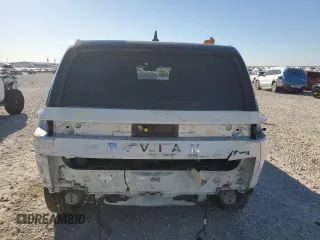 2023 Rivian R1S Adventure with VIN 7PDSGBBA4PN022157, listed as a Copart auction lot 81359984 with 13,522 mi miles and Salvage Title. Bid and sale history available at DreamBid. Image 6.