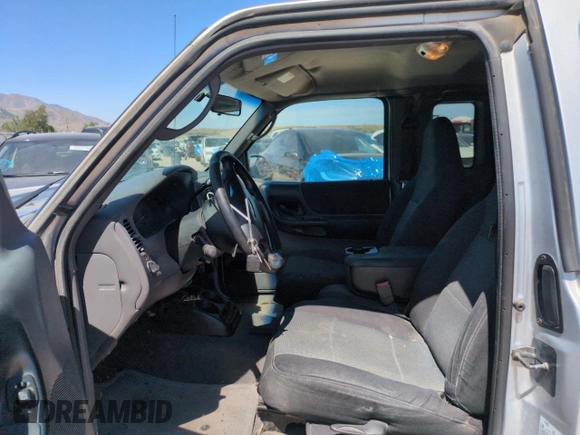 2003 Ford Ranger XL Fleet with VIN 1FTZR45E93PB55618, listed as a Copart auction lot 58780015 with 82,839 mi miles and Salvage title. Bid and sale history available at DreamBid. Image 7.