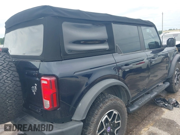 2021 Ford Bronco with VIN 1FMDE5BH2MLA85541, listed as a IAAI auction lot 42376748 with 53,724 mi miles and . Bid and sale history available at DreamBid. Image 4.