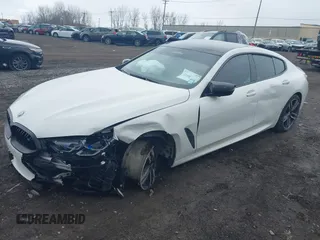 2023 BMW 8 Series M850i with VIN WBAGV8C06PCK97193, listed as a IAAI auction lot 41888779 with 40,845 mi miles and . Bid and sale history available at DreamBid. Image 2.