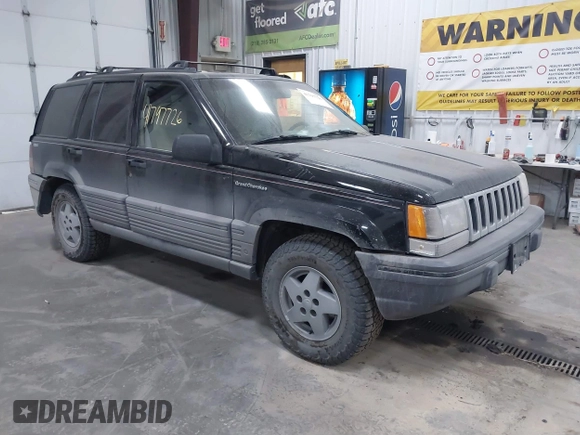 1995 Jeep Grand Cherokee Laredo with VIN 1J4GZ58S6SC765863, listed as a IAAI auction lot 41797726 with 234,715 mi miles and . Bid and sale history available at DreamBid. Image 1.
