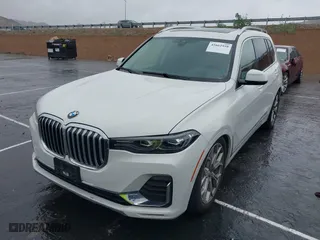 2019 BMW X7 xDrive40i with VIN 5UXCW2C57KL084137, listed as a IAAI auction lot 41662958 with 34,751 mi miles. Bid and sale history available at carsss.com. Image 2.
