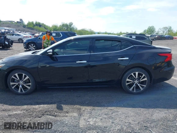 2018 Nissan Maxima SV with VIN 1N4AA6APXJC369633, listed as a IAAI auction lot 42256821 with 67,819 mi miles and . Bid and sale history available at DreamBid. Image 14.