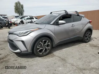 2020 Toyota C-HR LE with VIN JTNKHMBX7L1065098, listed as a Copart auction lot 50101395 with 51,933 mi miles and Salvage Title. Bid and sale history available at DreamBid. Image 1.