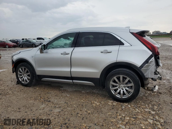 2021 Cadillac XT4 FWD Premium Luxury with VIN 1GYFZCR48MF083164, listed as a Copart auction lot 55377235 with 63,987 mi miles and Salvage title. Bid and sale history available at DreamBid. Image 2.