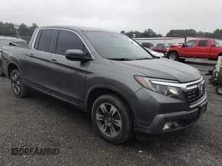 2017 Honda Ridgeline RTL with VIN 5FPYK3F58HB006571, listed as a IAAI auction lot 42515515 with 107,910 mi miles and . Bid and sale history available at DreamBid. Image 1.