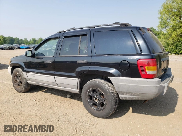2000 Jeep Grand Cherokee Laredo with VIN 1J4GW48S6YC404063, listed as a Copart auction lot 59442725 with 268,543 mi miles and Salvage title. Bid and sale history available at DreamBid. Image 2.