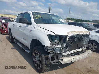 2013 Toyota Tundra z VIN 5TFDW5F14DX291970, wystawiony jako IAAI lot #42271888 z przebiegiem 158 515 mil mil oraz . Historia ofert i sprzedaży dostępna na DreamBid. Obrazek 1.