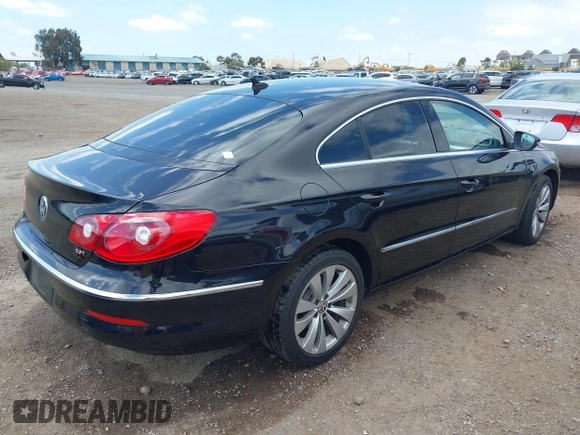 2012 Volkswagen CC Sport PZEV with VIN WVWMP7AN3CE516747, listed as a IAAI auction lot 42150237 with 125,157 mi miles. Bid and sale history available at carsss.com. Image 4.
