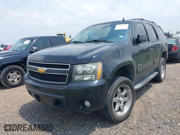 2014 Chevrolet Tahoe LT with VIN 1GNSCBE08ER193058, listed as a IAAI auction lot 42382232 with 228,749 mi miles and . Bid and sale history available at DreamBid. Image 6.