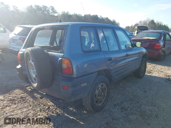 1997 Toyota RAV4 with VIN JT3GP10VXV0015872, listed as a IAAI auction lot 41827830 with 314,640 mi miles and . Bid and sale history available at DreamBid. Image 4.