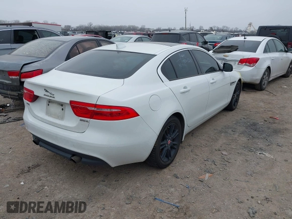 2018 Jaguar XE 25t Premium with VIN SAJAD4FXXJCP23943, listed as a IAAI auction lot 41470656 with 56,834 mi miles. Bid and sale history available at carsss.com. Image 4.