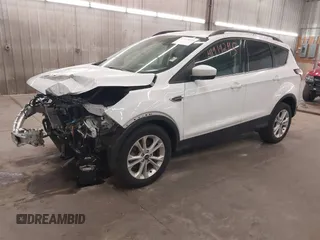 2018 Ford Escape SE z VIN 1FMCU9GD2JUB17518, wystawiony jako IAAI lot #41919245 z przebiegiem 102 626 mil mil oraz . Historia ofert i sprzedaży dostępna na DreamBid. Obrazek 18.