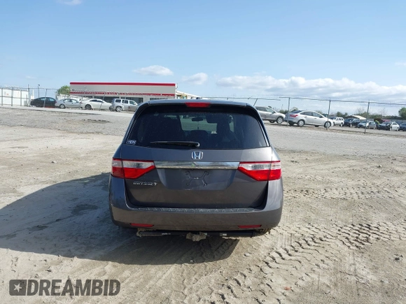 2013 Honda Odyssey EX-L with VIN 5FNRL5H62DB035649, listed as a IAAI auction lot 41849123 with 176,392 mi miles and . Bid and sale history available at carsss.com. Image 16.