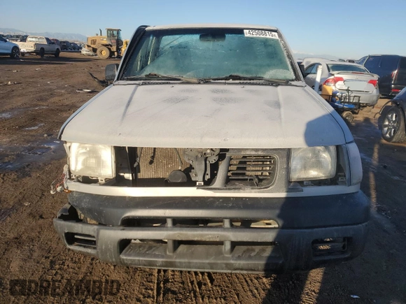 1999 Nissan Frontier XE with VIN 1N6DD21S4XC341893, listed as a Copart auction lot 42508815 with 86,040 mi miles and Salvage title. Bid and sale history available at DreamBid. Image 5.