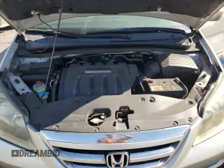 2005 Honda Odyssey EX-L z VIN 5FNRL386X5B407129, wystawiony jako Copart lot #56366655 z przebiegiem 181 893 mil mil oraz Szkoda całkowita • Salvage title. Historia ofert i sprzedaży dostępna na DreamBid. Obrazek 12.