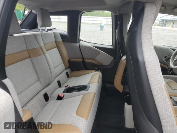 2015 BMW i3 z VIN WBY1Z4C59FV505134, wystawiony jako Copart lot #55181285 z przebiegiem Nie podano mil oraz Szkody całkowita. Historia ofert i sprzedaży dostępna na DreamBid. Obrazek 11.