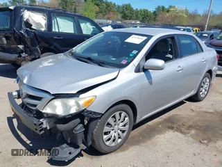 2012 Toyota Corolla L with VIN 2T1BU4EEXCC818354, listed as a IAAI auction lot 42129695 with 216,307 mi miles. Bid and sale history available at carsss.com. Image 18.