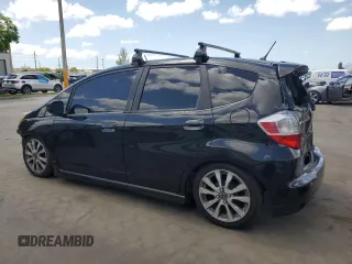 2013 Honda Fit Sport z VIN JHMGE8H5XDC074950, wystawiony jako Copart lot #57762905 z przebiegiem 68 185 mil mil oraz Szkody całkowita. Historia ofert i sprzedaży dostępna na DreamBid. Obrazek 2.