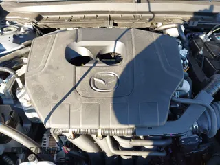 2023 Mazda CX-30 S Carbon Edition with VIN 3MVDMBCM3PM579345, listed as a IAAI auction lot 41689892 with 18,621 mi miles and . Bid and sale history available at DreamBid. Image 10.