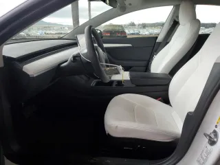 2023 Tesla Model 3 with VIN 5YJ3E1EA9PF515418, listed as a Copart auction lot 43785455 with 6,998 mi miles and Salvage Title. Bid and sale history available at carsss.com. Image 7.