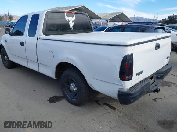 2000 Ford F-150 XL with VIN 1FTZX1727YKA78887, listed as a IAAI auction lot 41291272 with 289,343 mi miles. Bid and sale history available at carsss.com. Image 3.