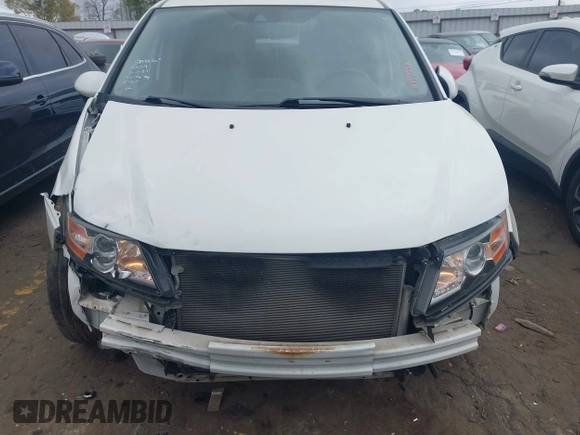 2016 Honda Odyssey EX-L with VIN 5FNRL5H67GB143253, listed as a IAAI auction lot 41952043 with 209,153 mi miles and . Bid and sale history available at DreamBid. Image 12.