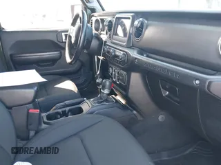 2020 Jeep Wrangler Unlimited Sport S с VIN 1C4HJXDG6LW285952, выставлен на аукционе IAAI как лот 41666200 с пробегом 37 089 миль миль и . История ставок и продаж доступна на DreamBid. Изображение 5.