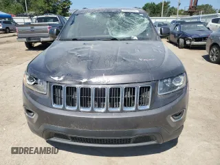 2016 Jeep Grand Cherokee Laredo with VIN 1C4RJFAG2GC328841, listed as a Copart auction lot 63553435 with 100,472 mi miles and Salvage title. Bid and sale history available at DreamBid. Image 5.