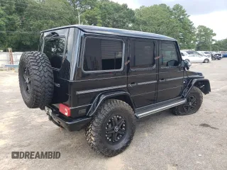 2014 Mercedes-Benz G-Class G 550 with VIN WDCYC3HF2EX214663, listed as a Copart auction lot 62703594 with 104,644 mi miles and Salvage Title. Bid and sale history available at carsss.com. Image 3.