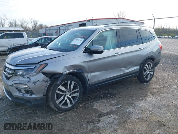 2016 Honda Pilot Touring with VIN 5FNYF6H90GB024902, listed as a IAAI auction lot 41948563 with 148,598 mi miles. Bid and sale history available at carsss.com. Image 22.