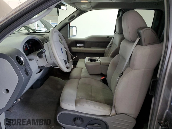 2004 Ford F-150 STX with VIN 1FTRX12W04NB57157, listed as a Copart auction lot 56952615 with 88,961 mi miles and Salvage title. Bid and sale history available at DreamBid. Image 7.